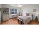 This bedroom has a vintage-style bed frame and chair at 174 Crumley St, Atlanta, GA 30312