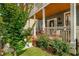 Inviting front porch with lush landscaping, beautiful porch, and well-maintained lawn at 174 Crumley St, Atlanta, GA 30312