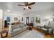 Comfortable living room with hardwood floors, neutral walls, stylish furniture, and a ceiling fan at 174 Crumley St, Atlanta, GA 30312