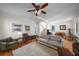 Spacious living room with hardwood floors, cozy seating arrangement, and a welcoming atmosphere at 174 Crumley St, Atlanta, GA 30312