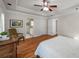 The main bedroom includes hardwood floors, a ceiling fan, and access to the bathroom at 174 Crumley St, Atlanta, GA 30312