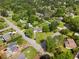 An aerial view of the home showcasing mature trees, landscaping, and neighborhood at 1903 Lochlomand Se Ln, Smyrna, GA 30080