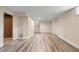 Finished basement with new flooring, neutral walls, closet and a doorway at 1903 Lochlomand Se Ln, Smyrna, GA 30080
