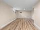 Spacious finished basement with new flooring and neutral colored walls and trim at 1903 Lochlomand Se Ln, Smyrna, GA 30080