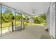 Enclosed porch with a view of the backyard at 1903 Lochlomand Se Ln, Smyrna, GA 30080