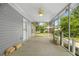 Enclosed porch featuring neutral paint, natural light, and outdoor view at 1903 Lochlomand Se Ln, Smyrna, GA 30080