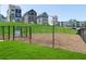 Dog park for residents, featuring a secure fenced area with greenery, promoting an active lifestyle at 2676 Brookview Nw Ln, Atlanta, GA 30318