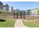 Community dog park with access gate and signage at 2676 Brookview Nw Ln, Atlanta, GA 30318