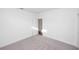 A bright and airy bedroom with neutral carpeting at 711 Dodd N Ln # 166, Buford, GA 30518