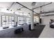 Spacious gym featuring modern equipment, ceiling fans, and large windows for a refreshing workout experience at 711 Dodd N Ln # 166, Buford, GA 30518