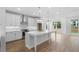 Bright kitchen with a large island, stainless steel appliances, and recessed lighting at 711 Dodd N Ln # 166, Buford, GA 30518
