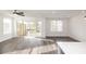 Spacious living room with lots of natural light and sliding door to the patio at 711 Dodd N Ln # 166, Buford, GA 30518