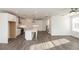 Open floor plan featuring kitchen, dining, and living room, perfect for entertaining at 711 Dodd N Ln # 166, Buford, GA 30518