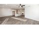 Open concept featuring kitchen, dining, and living room, perfect for entertaining at 711 Dodd N Ln # 166, Buford, GA 30518