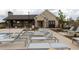 Inviting poolside area with numerous loungers, perfect for relaxation, with a charming clubhouse nearby at 711 Dodd N Ln # 166, Buford, GA 30518