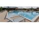 Beautiful community pool with clear blue water, ample seating, and a nearby clubhouse at 711 Dodd N Ln # 166, Buford, GA 30518