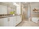 Bathroom featuring a double vanity, walk-in shower, and a separate soaking tub at 1199 Huff Nw Rd # 127, Atlanta, GA 30318