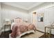 A bedroom featuring a cozy bed with stylish bedding and modern decor accents for a relaxing space at 1199 Huff Nw Rd # 127, Atlanta, GA 30318