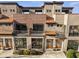 Beautiful multi-story condo with brick and stone facade, balconies, and well-maintained landscaping offering stunning curb appeal at 1199 Huff Nw Rd # 127, Atlanta, GA 30318