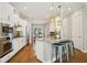 Well-equipped kitchen with a center island, stainless steel appliances and ample cabinet space for storage and cooking at 1199 Huff Nw Rd # 127, Atlanta, GA 30318