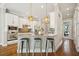 Modern kitchen with stainless steel appliances and stylish island seating perfect for casual dining at 1199 Huff Nw Rd # 127, Atlanta, GA 30318