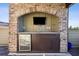 Enjoy this outdoor kitchen area complete with a TV, refrigerator and sink, making it great for entertaining at 1199 Huff Nw Rd # 127, Atlanta, GA 30318