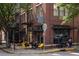 Exterior shot of a brick coffee shop with outdoor seating and sidewalk access at 461 Bartram Se St # A, Atlanta, GA 30316