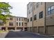 Exterior shot of townhome complex showing unit facades and parking spaces at 461 Bartram Se St # A, Atlanta, GA 30316