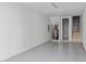 This is an unfinished garage interior, featuring grey epoxy floors, and access to the upper level at 461 Bartram Se St # A, Atlanta, GA 30316