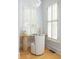 Cozy office nook with hardwood floors, natural light, and a minimalist workspace with bright white windows at 461 Bartram Se St # A, Atlanta, GA 30316