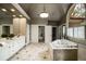 Large bathroom with tiled floors, and vanity, walk in shower and stand alone tub at 95 Grogans Lndg, Atlanta, GA 30350