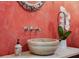 Stylish bathroom sink with a decorative mirror and an orchid beside it at 95 Grogans Lndg, Atlanta, GA 30350
