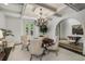 Elegant dining room featuring coffered ceilings and a stylish chandelier at 95 Grogans Lndg, Atlanta, GA 30350