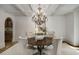 Bright dining room with coffered ceilings and hardwood floors at 95 Grogans Lndg, Atlanta, GA 30350