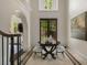 Bright foyer featuring travertine tile flooring, arched doorways and a decorative table at 95 Grogans Lndg, Atlanta, GA 30350
