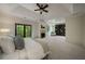 Comfortable main bedroom suite features a sitting area, fireplace, and French doors to a private balcony at 95 Grogans Lndg, Atlanta, GA 30350