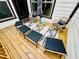 Outdoor deck furnished with stylish seating, a cozy rug, and umbrella, creating a relaxing space at 1320 Stanley Park Dr # 141, Decatur, GA 30033