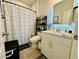 Well-lit bathroom with a vanity, a large mirror, and a shower curtain at 1320 Stanley Park Dr # 141, Decatur, GA 30033
