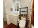 Modern bathroom with a vanity, toilet, modern mirror and decorative shelving at 1320 Stanley Park Dr # 141, Decatur, GA 30033