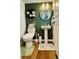 Stylish half bathroom features a round mirror and pedestal sink, offering a modern touch at 1320 Stanley Park Dr # 141, Decatur, GA 30033
