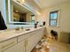 Bright bathroom featuring a double vanity with modern lighting and fixtures at 1320 Stanley Park Dr # 141, Decatur, GA 30033