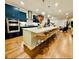 Spacious kitchen featuring a large island with seating, pendant lights, and modern appliances at 1320 Stanley Park Dr # 141, Decatur, GA 30033
