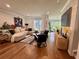 Bright living room features a comfortable sectional sofa and hardwood floors, perfect for relaxing and entertaining at 1320 Stanley Park Dr # 141, Decatur, GA 30033