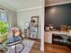 Charming living area with decorative ladder, coffee bar, and large window with natural light at 1320 Stanley Park Dr # 141, Decatur, GA 30033