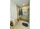 Updated shower with a glass enclosure and sleek fixtures in updated bathroom at 1320 Stanley Park Dr # 141, Decatur, GA 30033