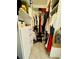 Organized walk-in closet with shelves, drawers, hanging rods, and a full length mirror at 1320 Stanley Park Dr # 141, Decatur, GA 30033
