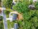 Aerial view showcasing the home's location, driveway, and proximity to lush greenery at 4205 Mabry Ne Rd, Roswell, GA 30075