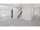 Spacious finished basement offers open space, stairs, and doorways for flexible use at 4205 Mabry Ne Rd, Roswell, GA 30075