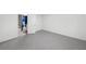 Basement featuring a room and an open doorway view into a bathroom space at 4205 Mabry Ne Rd, Roswell, GA 30075