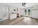Bright bedroom with hardwood floors and french doors leading to outdoor deck at 4205 Mabry Ne Rd, Roswell, GA 30075